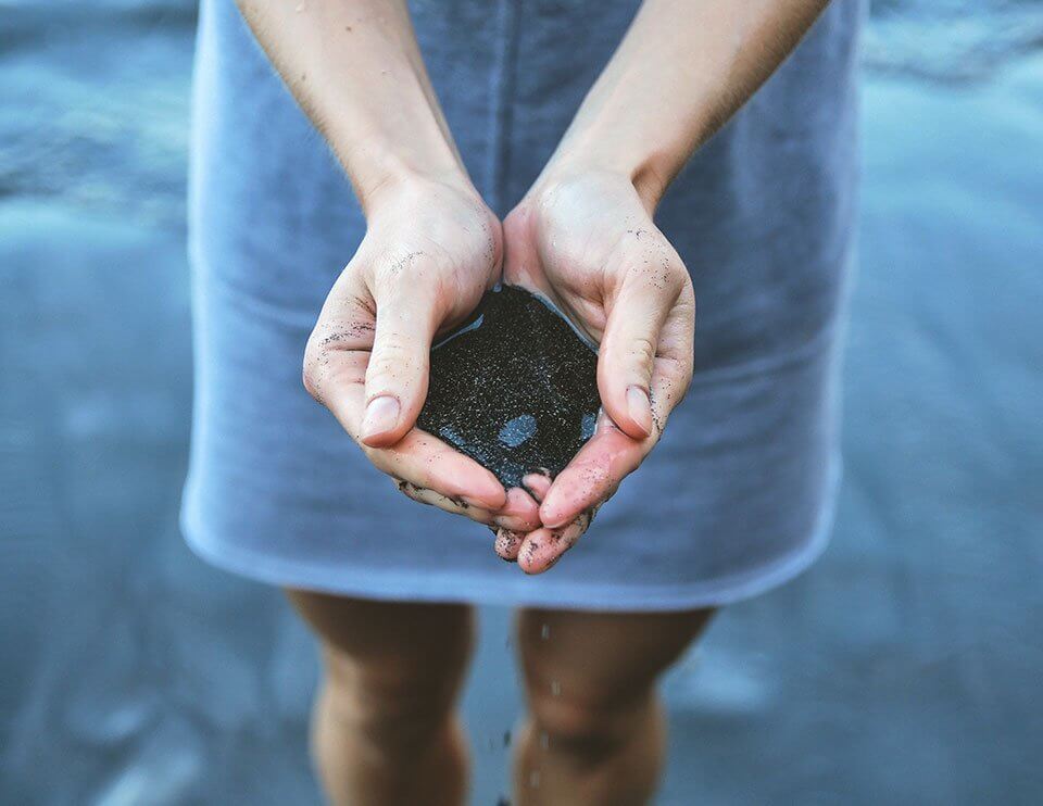 bipolar woman holding sand